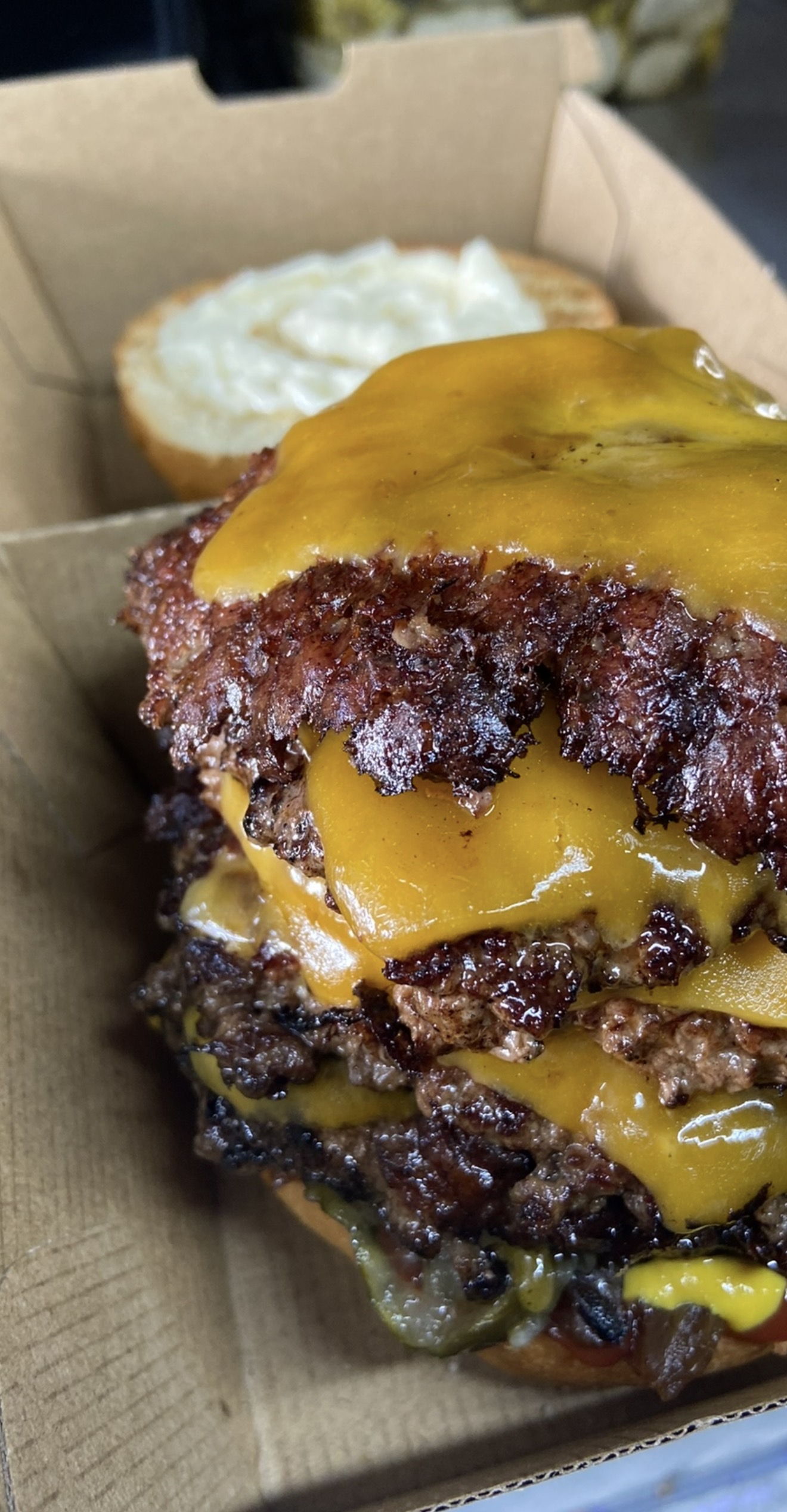 Stacked burger bar meal presentation